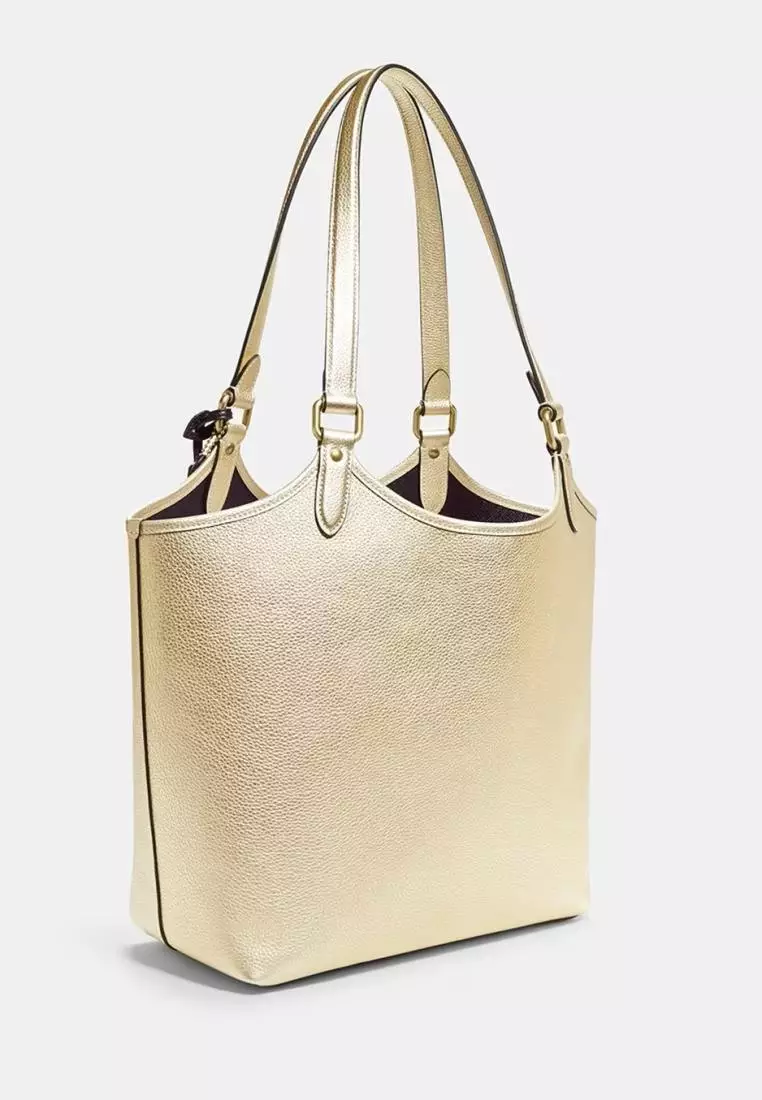 Coach gold tote sales bag