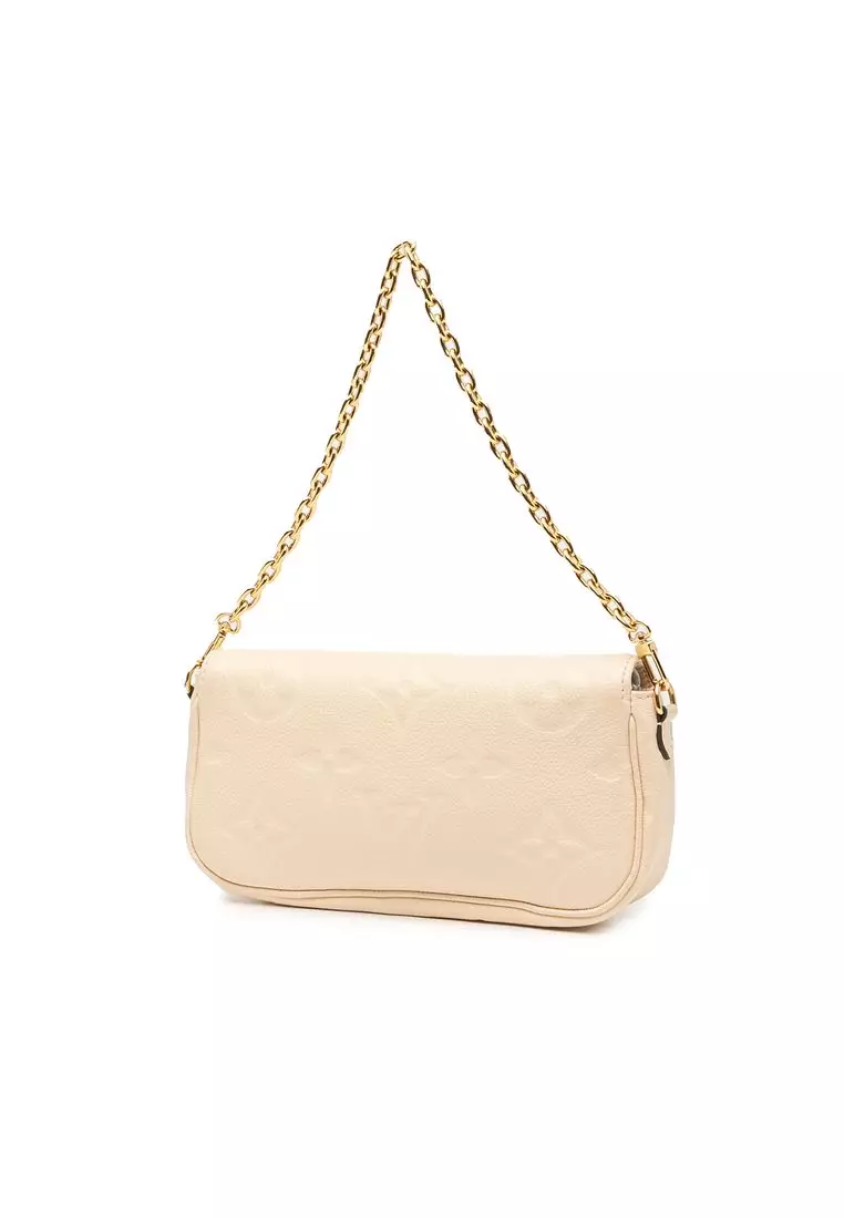 Pre-Loved Louis Vuitton Monogram Empreinte Giant Ivy Wallet On Chain