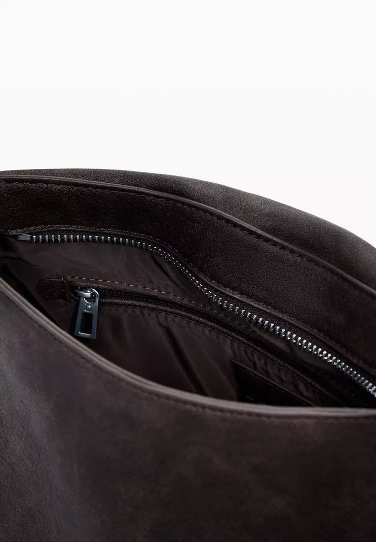 Medium faux leather buckle bag