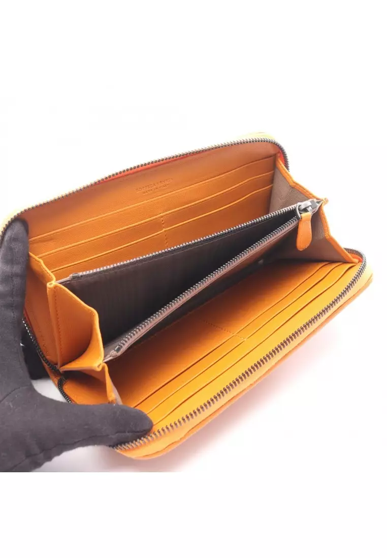 BOTTEGA VENETA ラウンドファスナーウォレット　Orange Buy Bottega Veneta Pre-Loved BOTTEGA VENETA Intrecciato round