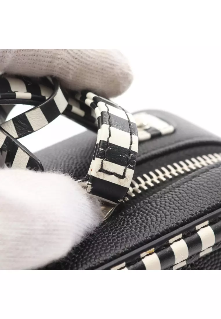 Pre-Loved Chanel CC filigree Small vanity bag chain shoulder bag Stripes Caviar skin black white silver hardware 2WAY