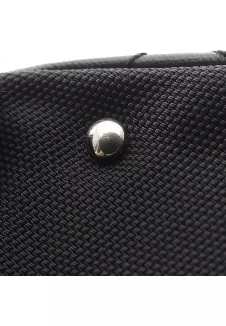 Pre-Loved Chanel Paris Biarritz GM Handbag tote bag Coated canvas leather black silver hardware