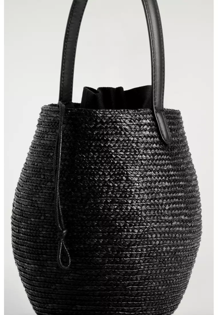 Buy COS SCULPTED BUCKET BAG - STRAW 2026 Online | ZALORA