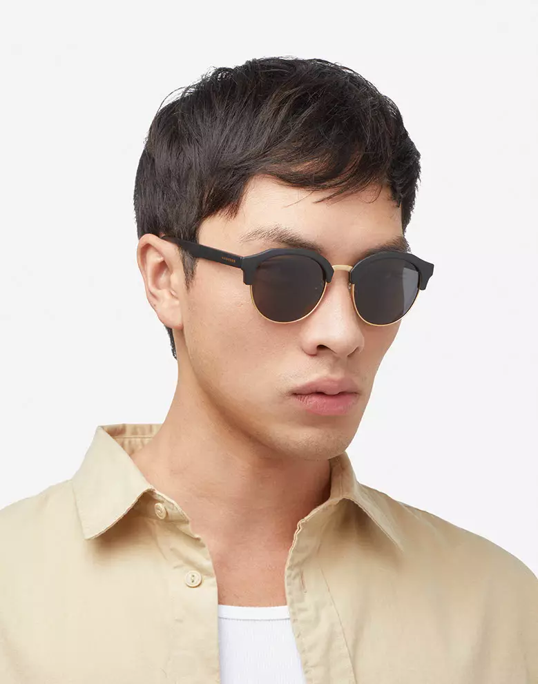 HAWKERS POLARIZED Gold Dark CLASSIC ROUNDED Sunglasses for Men and Women, Unisex. UV400 Protection. Official Product designed in Spain