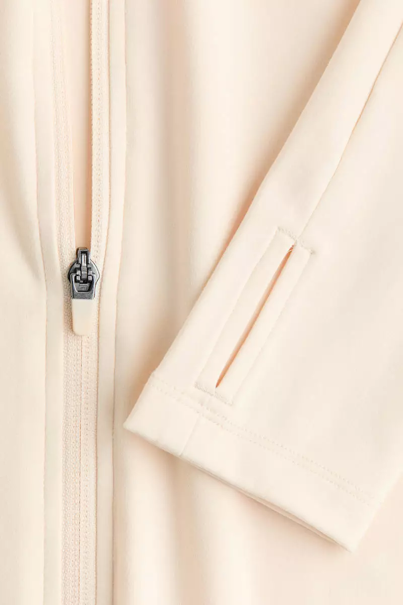 Zip-through sports jacket with SoftMove™