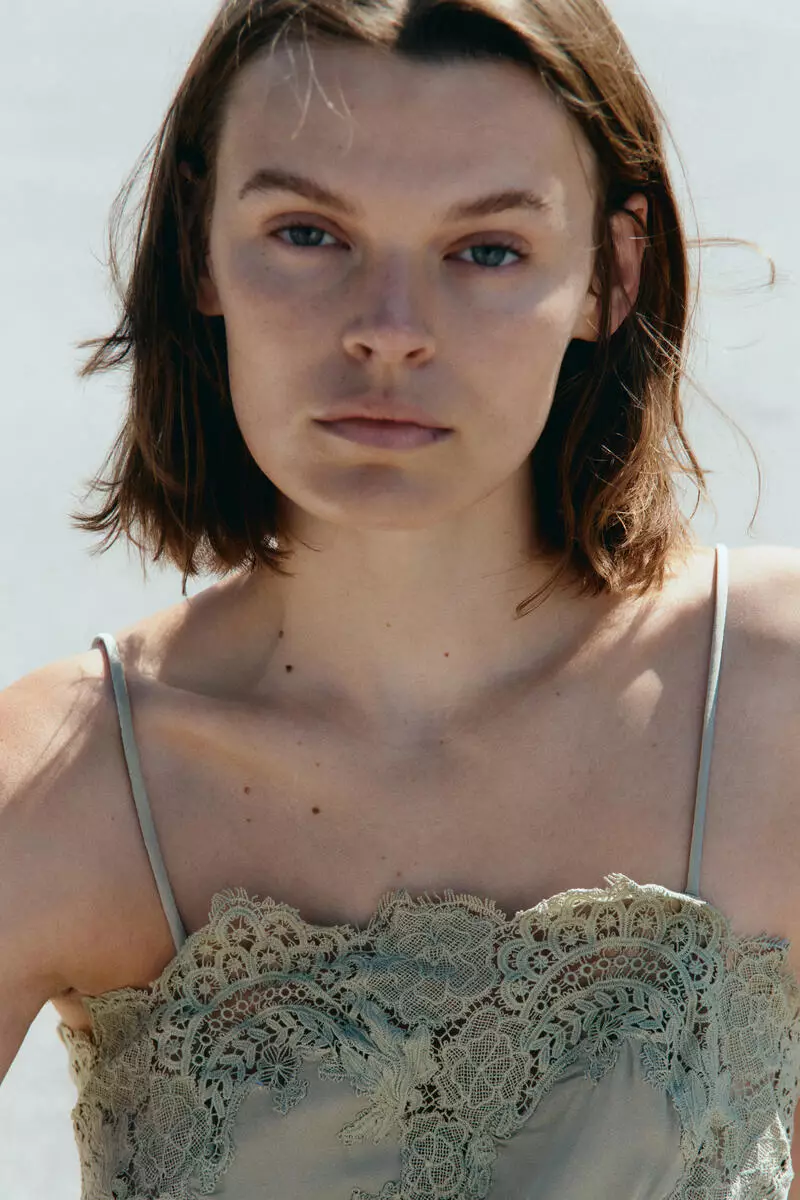 Lace-trimmed viscose top