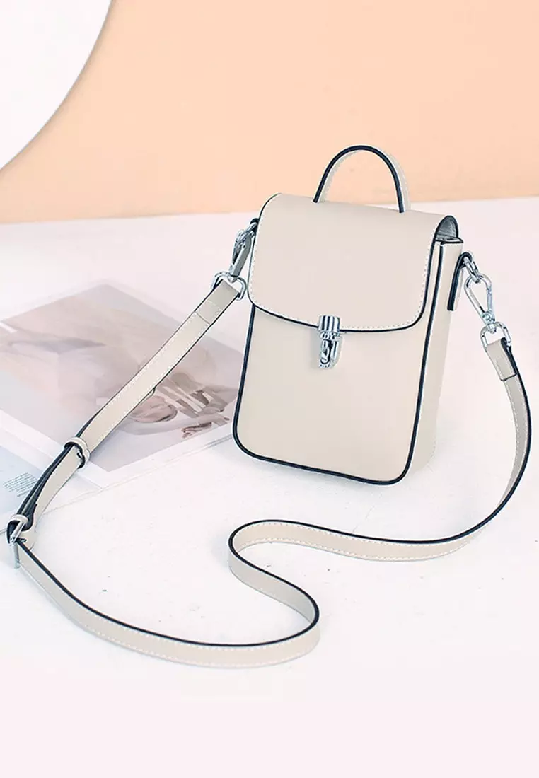 Mobile phone over shoulder bag hot sale