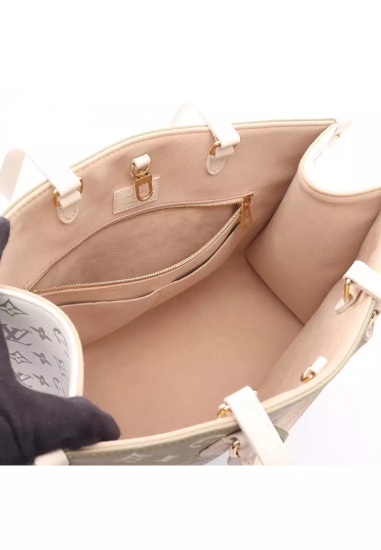 Pre-Loved Louis Vuitton On-the-go MM monogram Amplant Handbag tote bag leather Khaki green ivory 2WAY