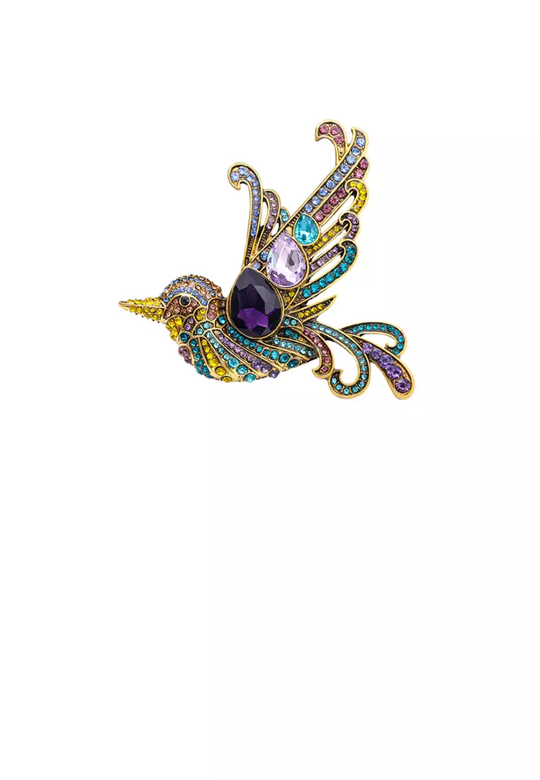 Gold bird brooch hotsell