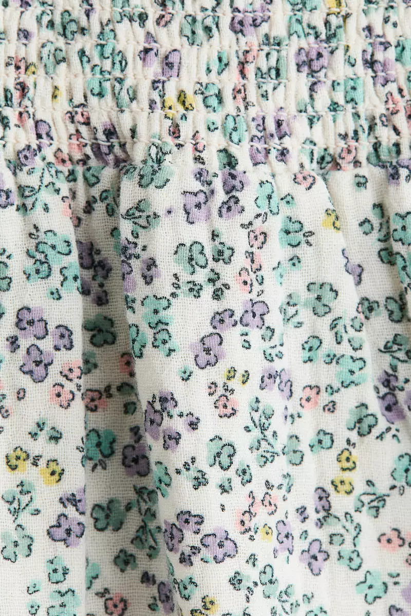 Smocked flounce-trimmed dress