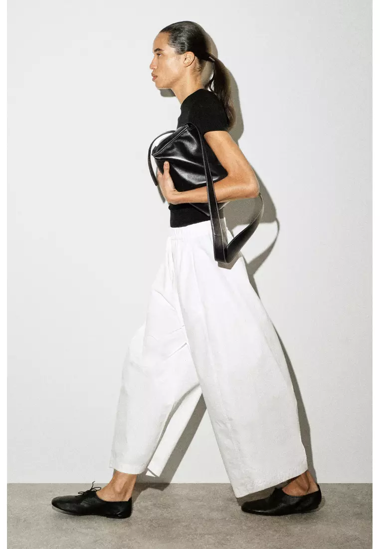 ELASTICATED BARREL-LEG TROUSERS