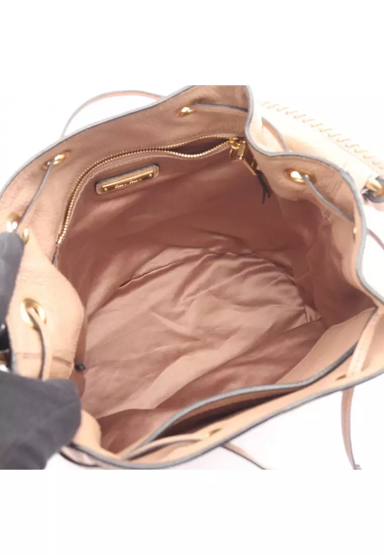 Pre-Loved MIU MIU Handbag leather pink beige 2WAY drawstring