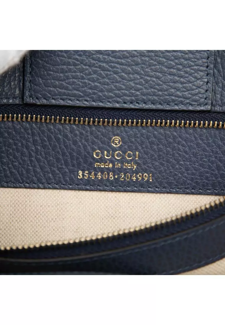 Pre-Loved Gucci Medium Dollar Calfskin Swing Tote