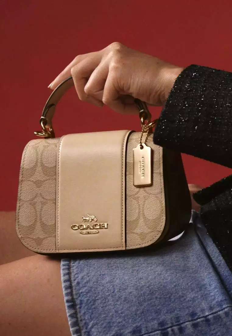 Coach signature discount top handle crossbody