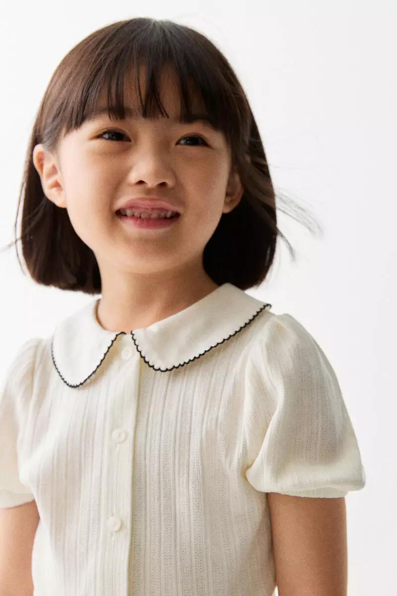 Short-sleeved pointelle blouse