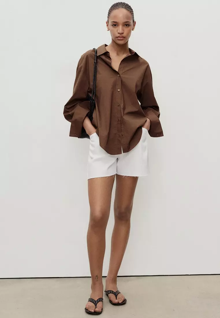 Denim Shorts With Frayed Hem And Pleats