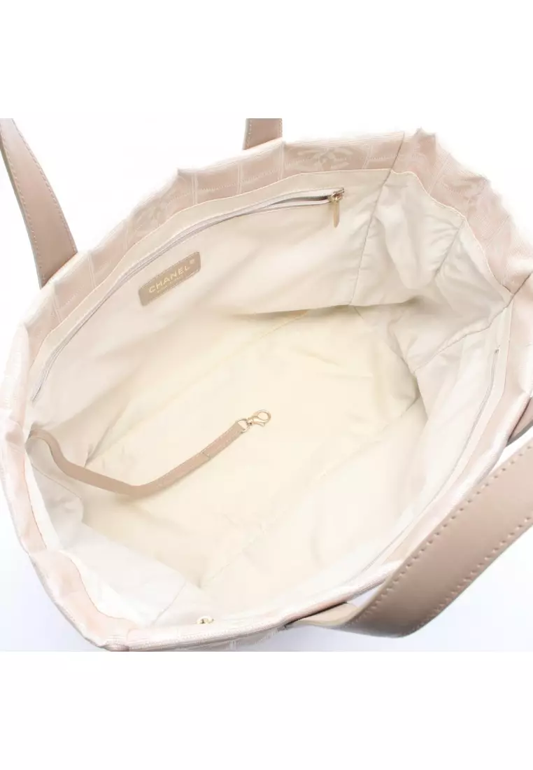 Pre-Loved Chanel New travel line MM Handbag tote bag nylon canvas beige gold hardware
