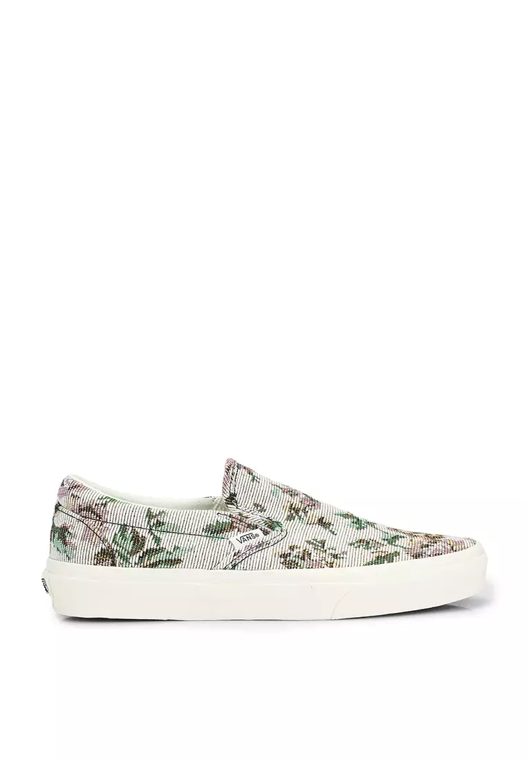 White slip on deals vans with flowers