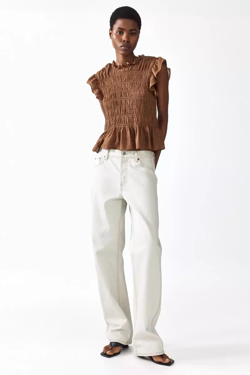 Smocked peplum top