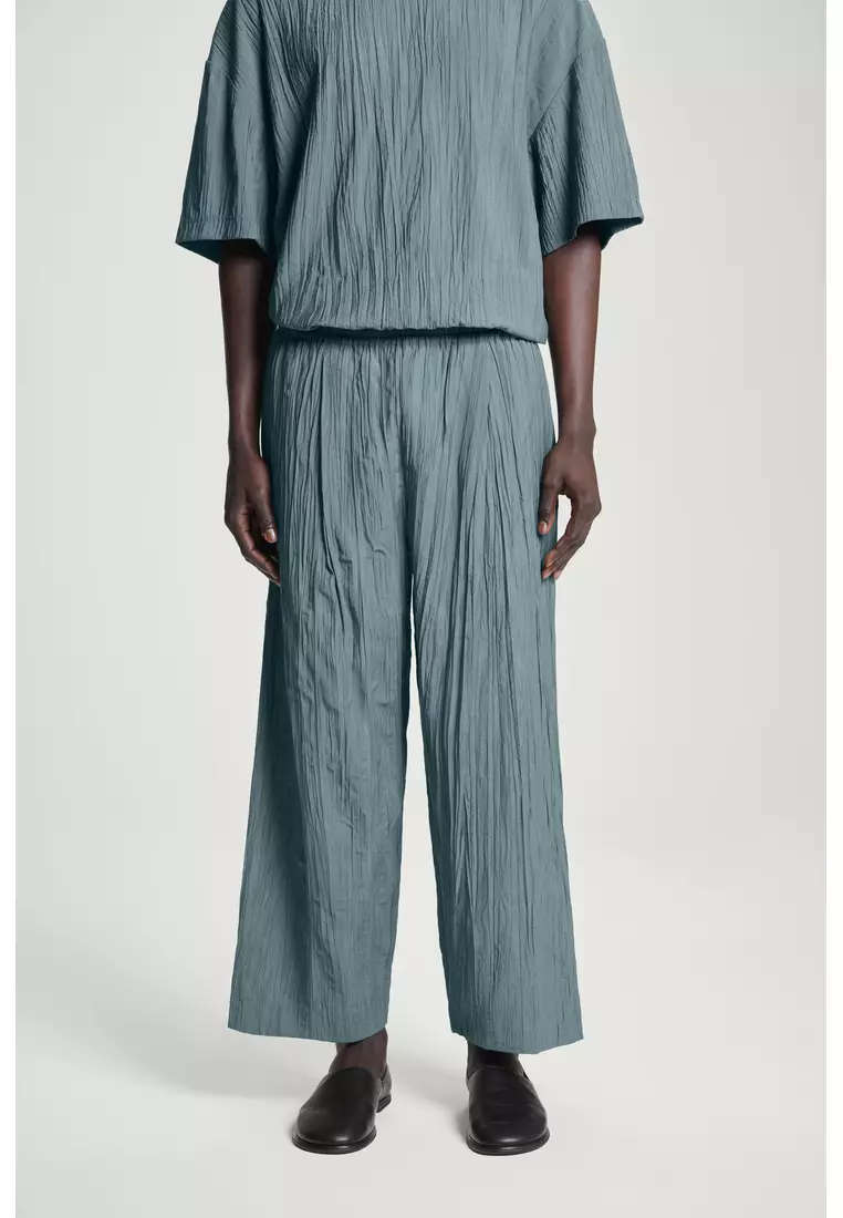 CRINKLED WIDE-LEG TROUSERS
