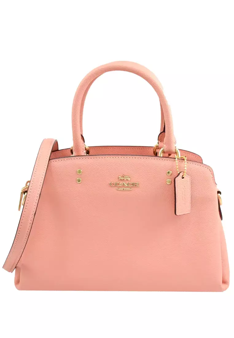 Pink coach best sale mini purse