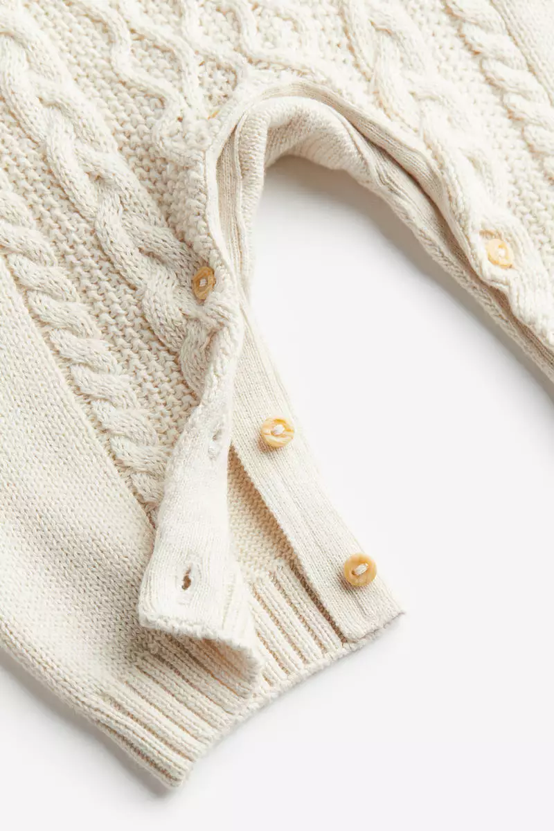 Knitted romper suit