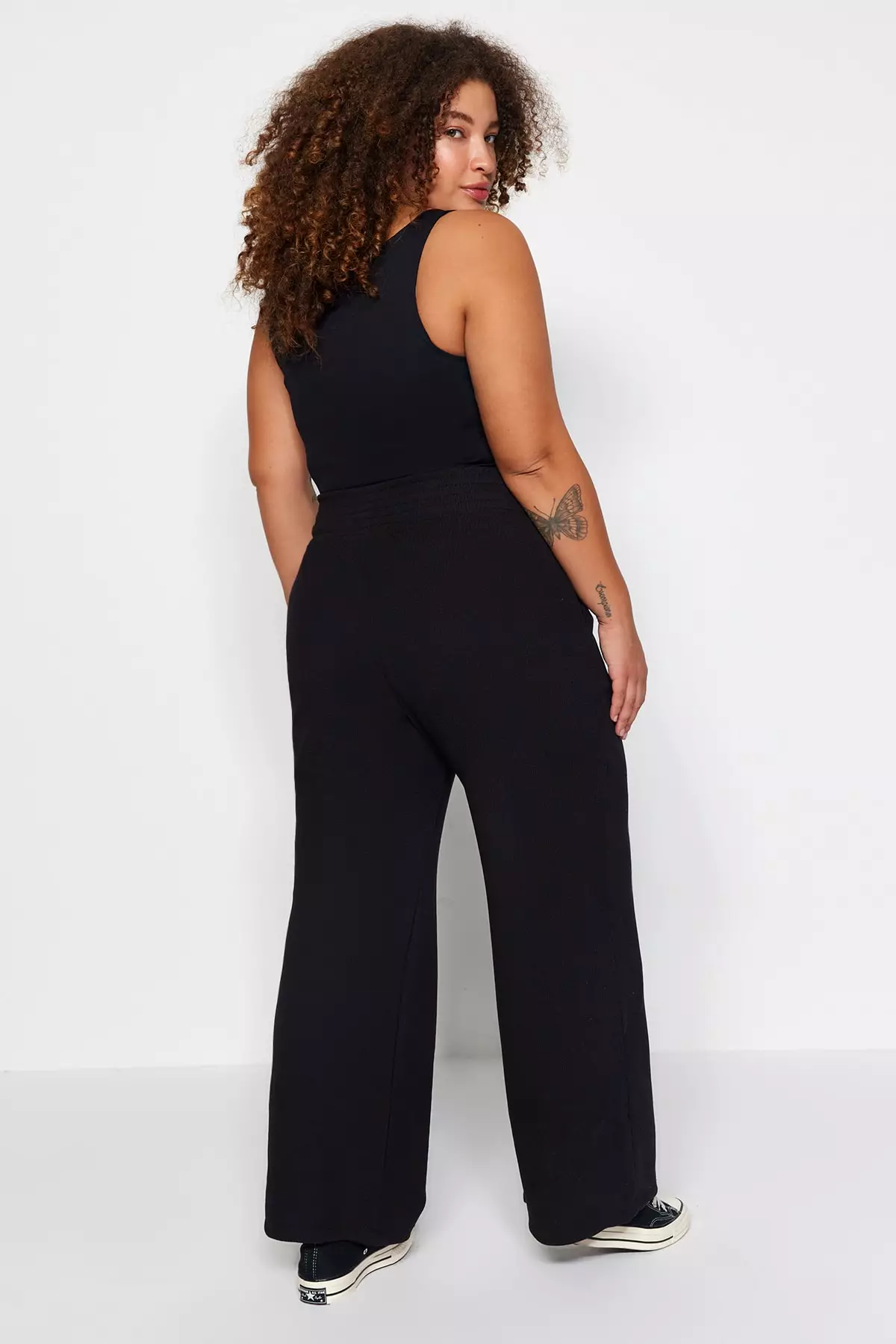 Buy Trendyol Plus Size Black Knitted Fleece Leggings in Black 2024