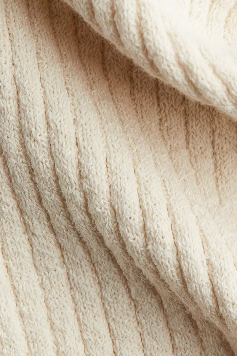 Flared rib-knit trousers