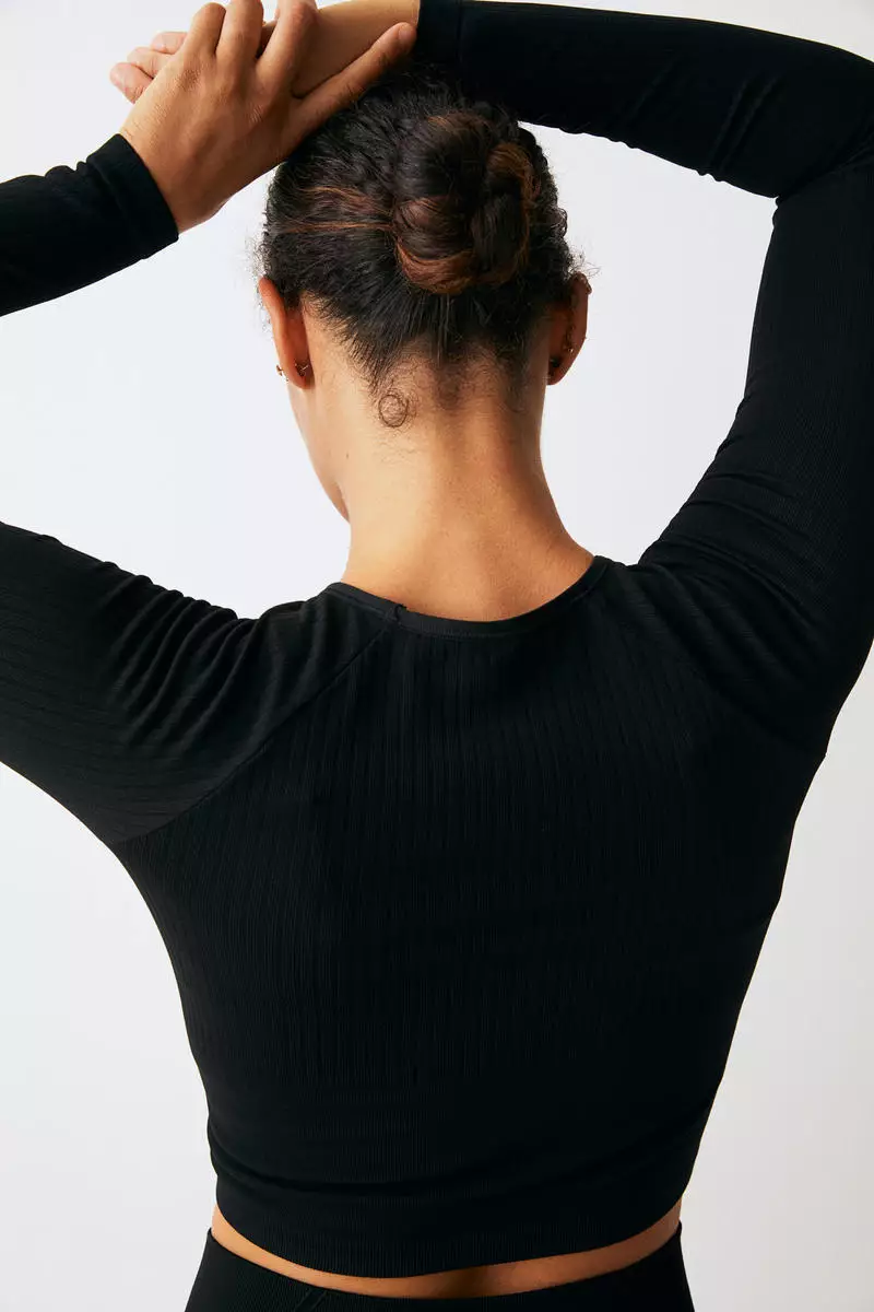 Buy H&M DryMove™ Seamless Cropped sports top 2025 Online