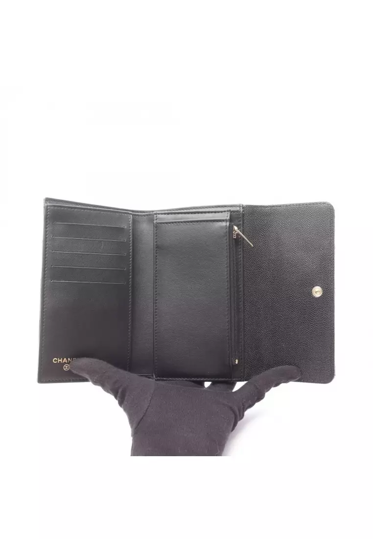 Pre-Loved Chanel matelasse trifold wallet Caviar skin black gold hardware