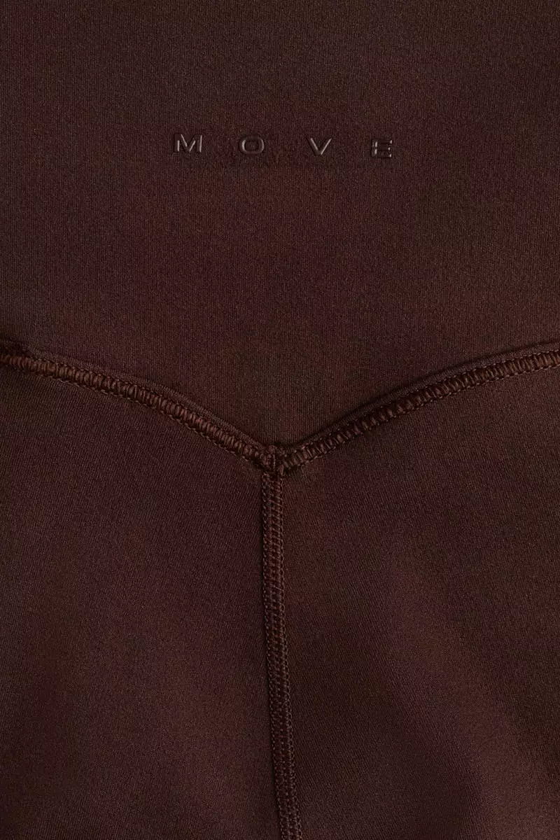 Pocket-detail sports leggings with SoftMove™