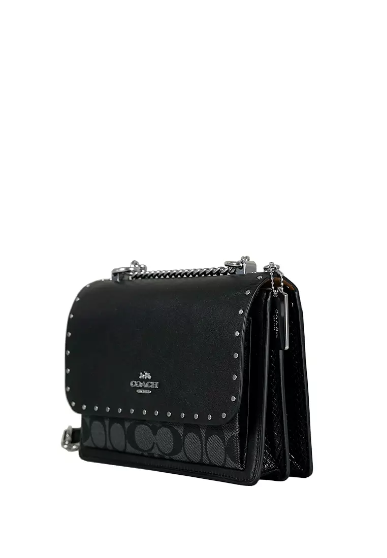 Klare Crossbody In Signature Canvas With Rivets Graphite Black