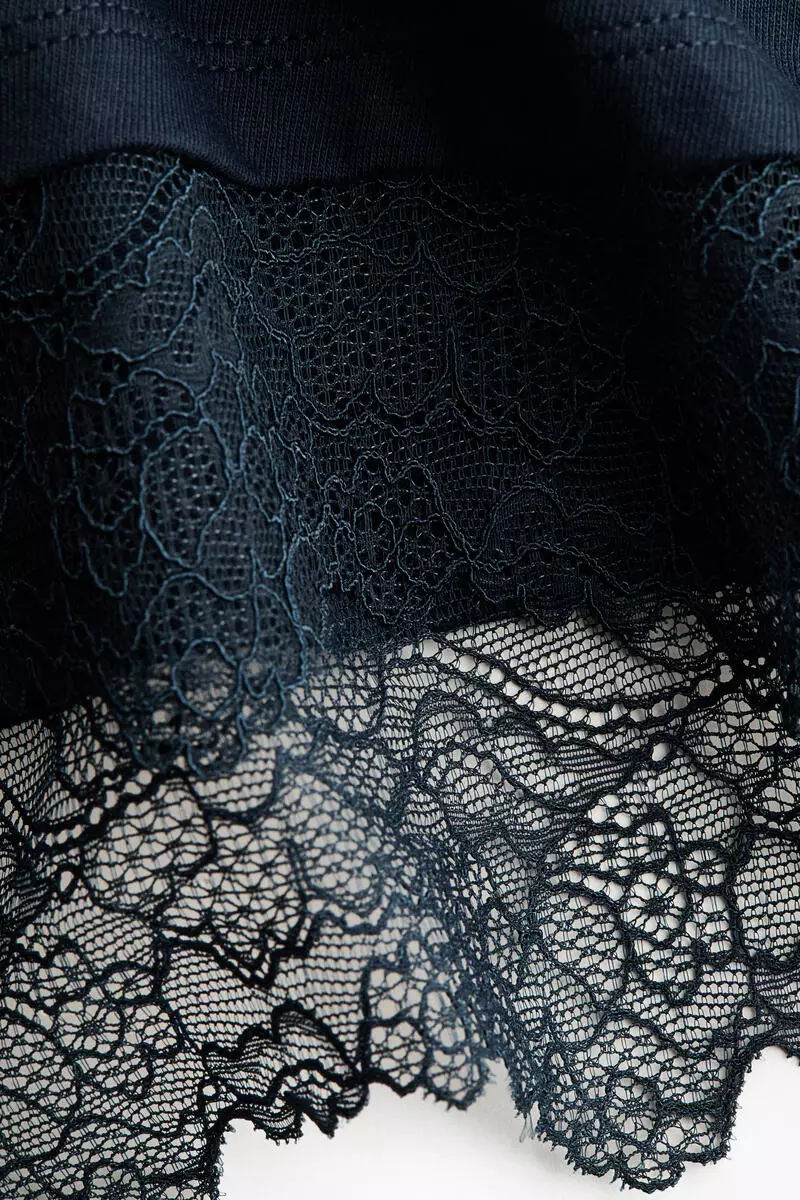 Asymmetric lace-trimmed T-shirt