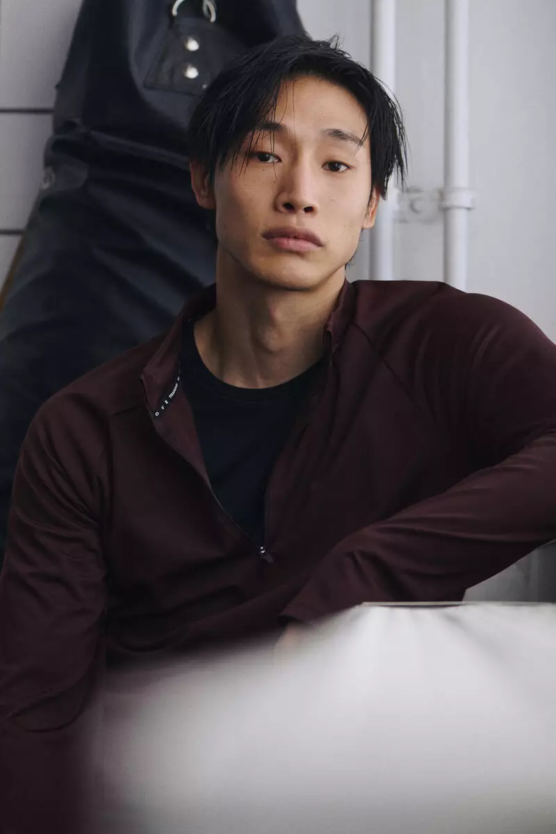 Zip-top midlayer sports top with ThermoMove™