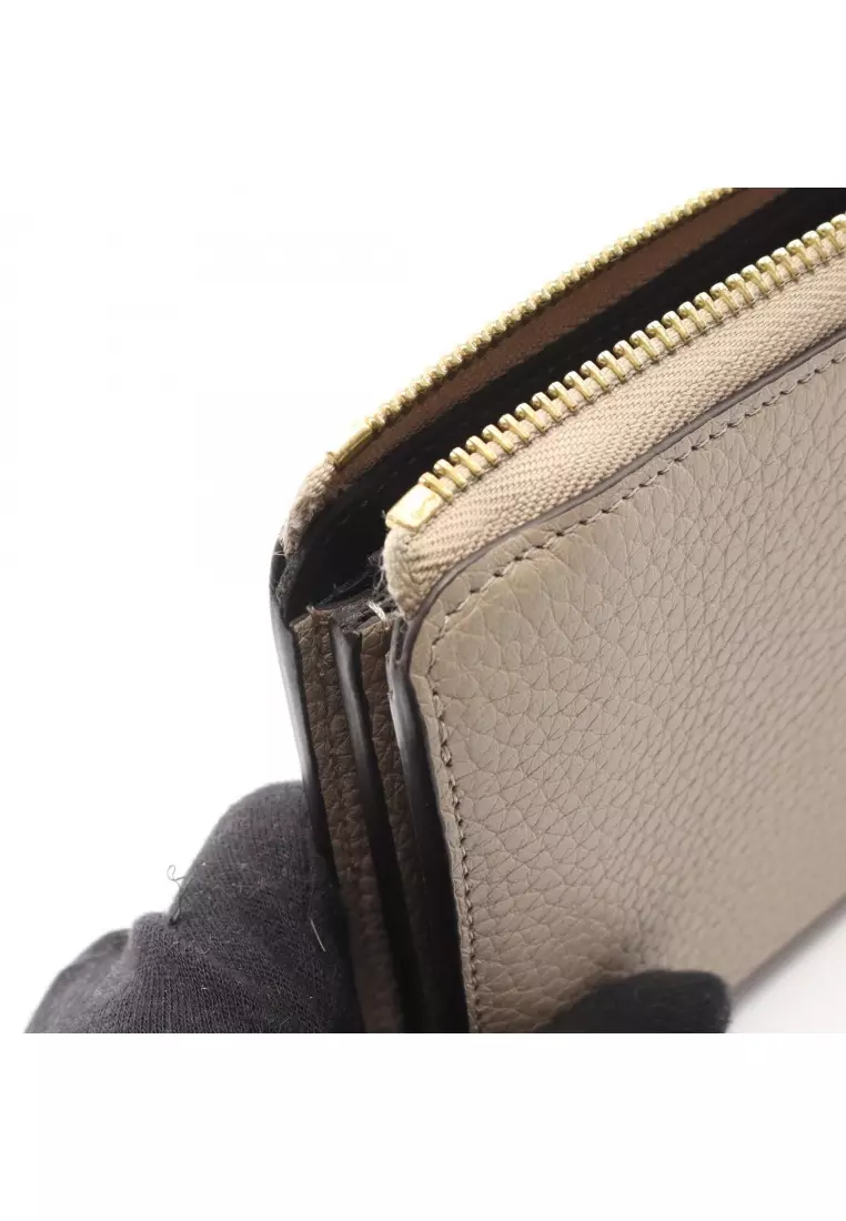 Pre-Loved Louis Vuitton Portefeuil comet Carré L-shaped zipper long wallet taurillon leather Gray beige