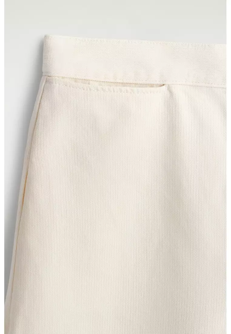 CROPPED WIDE-LEG DENIM TROUSERS