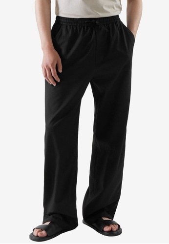 COS black Relaxed-Fit Drawstring Trousers 0C08AAAFF73D46GS_1