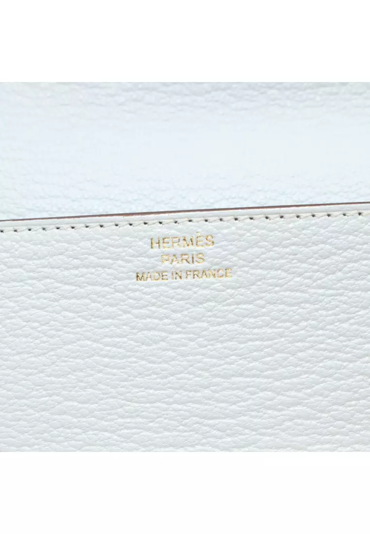 Pre-Loved Hermès Lawris Ruri slim Bi-fold wallet Chevre Light blue gold hardware Z stamp