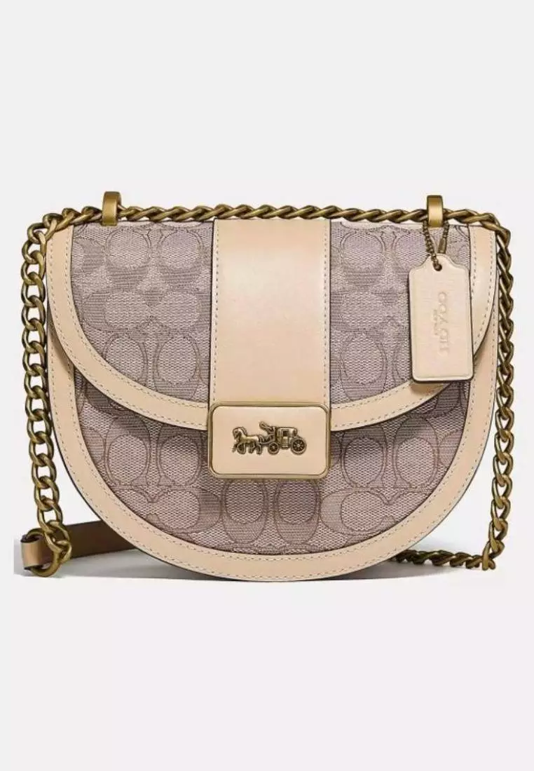 Coach saddle 20 in signature online jacquard