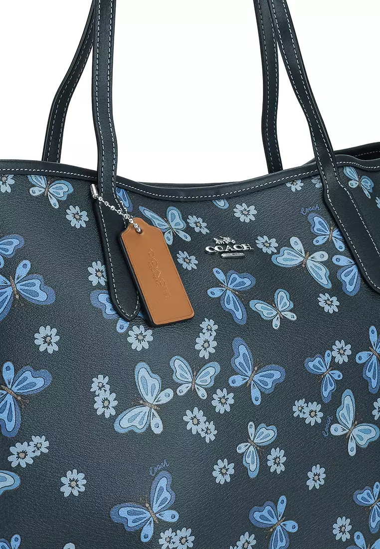 Reversible city tote in signature canvas with butterfly print hot sale