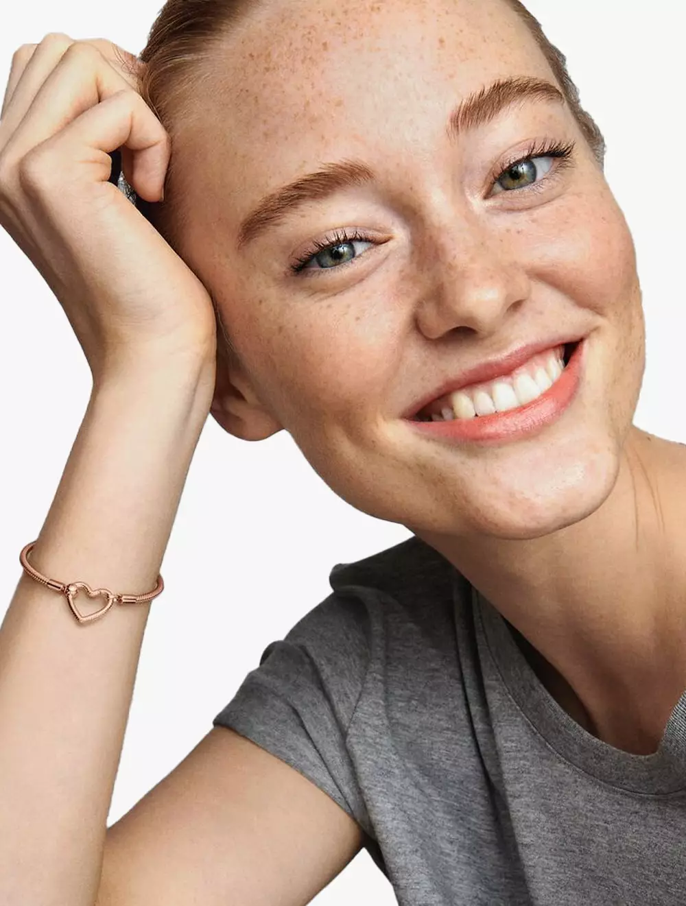 Snake chain 14k rose gold-plated bracelet with heart clasp