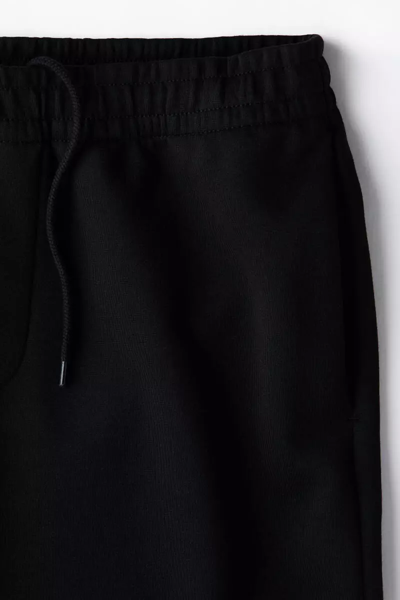 Relaxed Fit Interlock Sweatpants