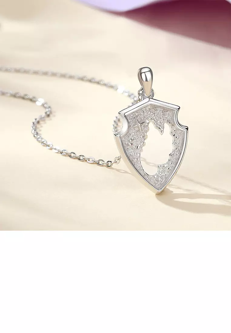 Gold best sale shield pendant