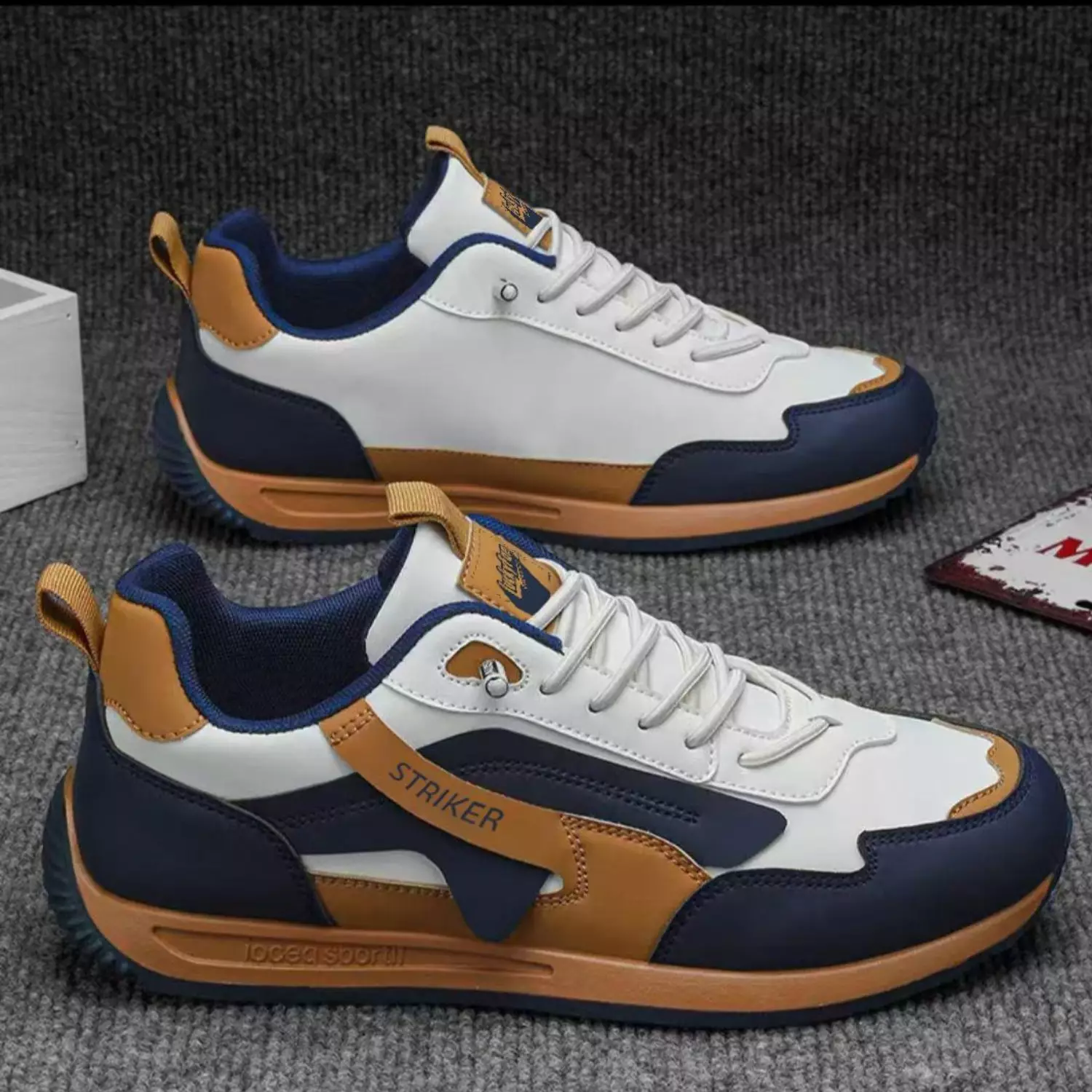 Sepatu Sneaker Striker