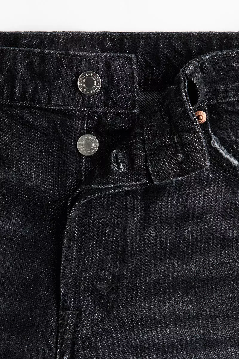 Raw-edge denim shorts