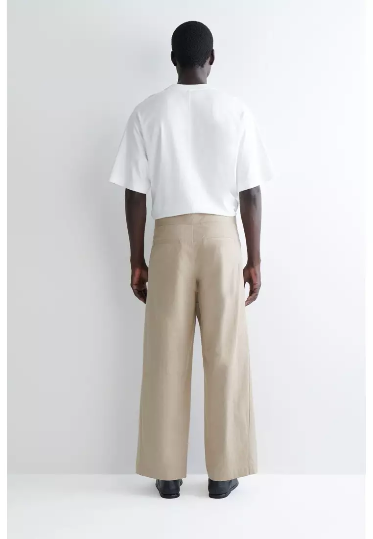Buy COS BARREL-LEG COTTON UTILITY TROUSERS 2026 Online | ZALORA