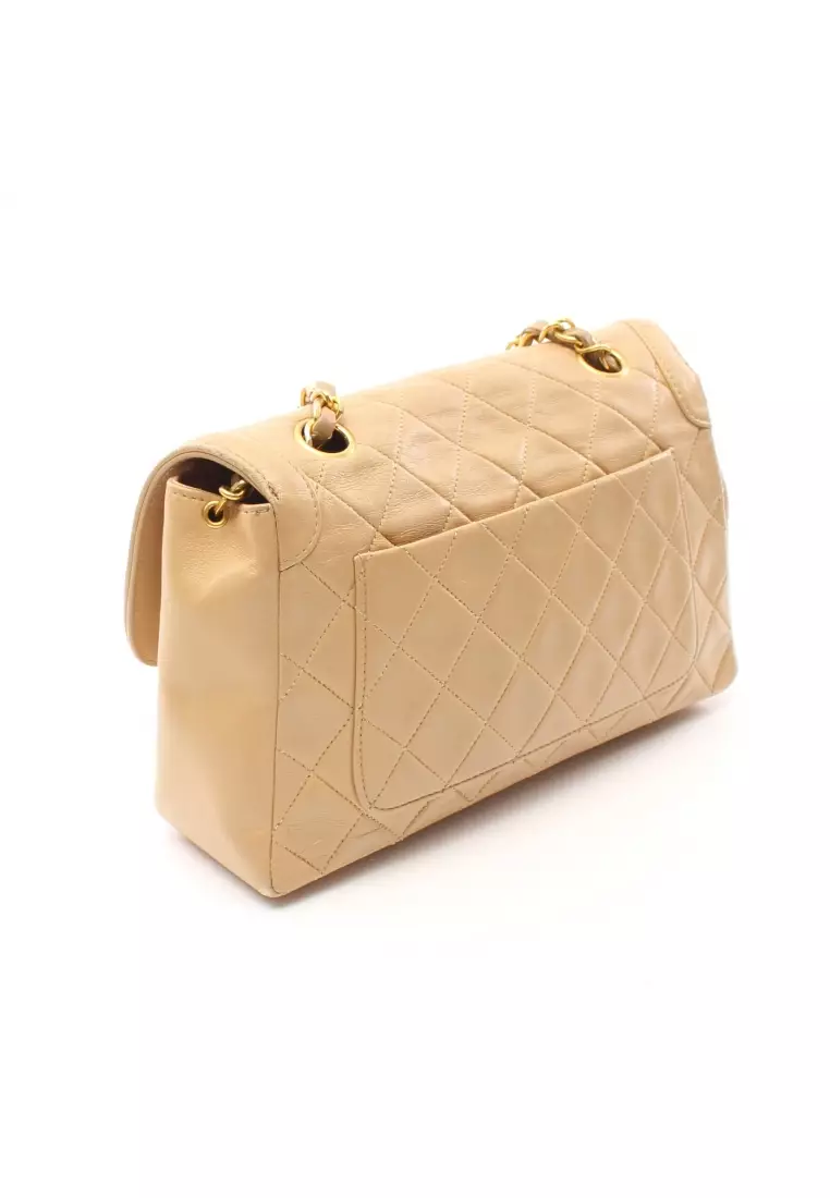 Sac chanel top matelassé beige
