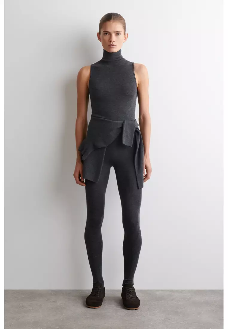 SEAMLESS MERINO WOOL HIGH-NECK TOP