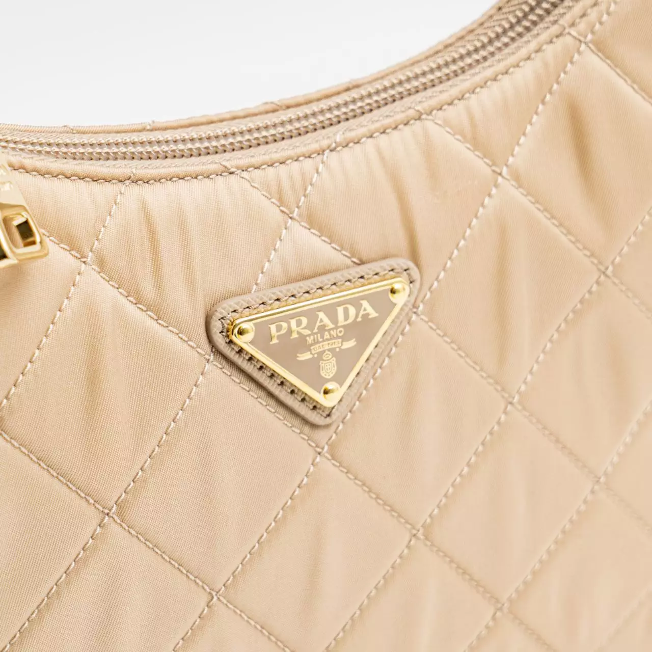 Jual Prada Prada ReEdition Quilted Nylon Shoulder Bag Cameo Beige Original 2024 ZALORA