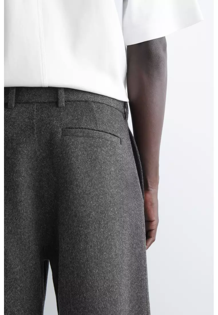 SPLIT WOOL WIDE-LEG TROUSERS